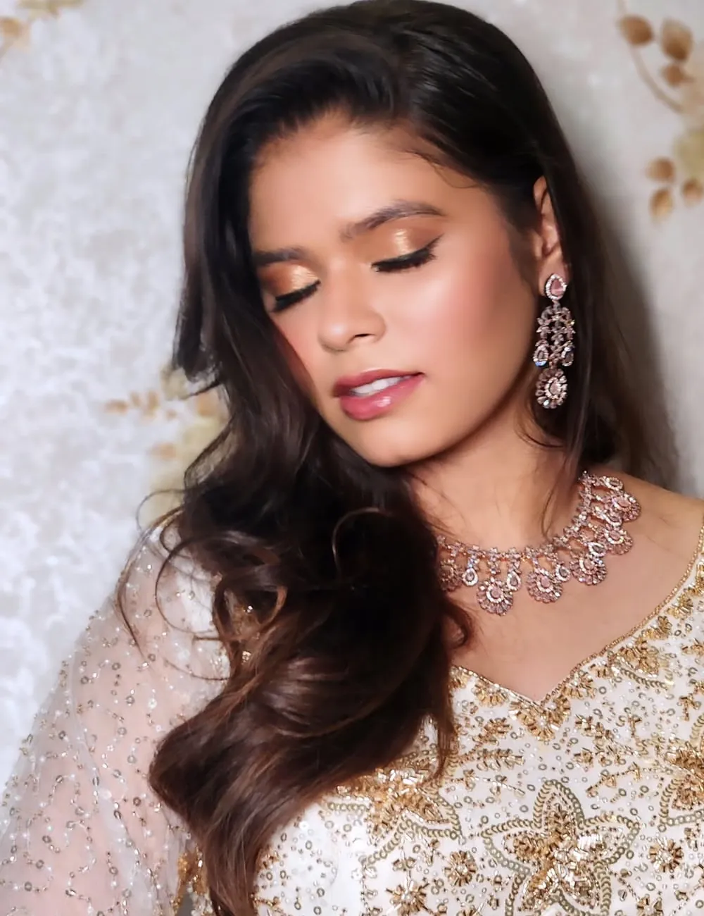 Gold-toned glam reception makeup look